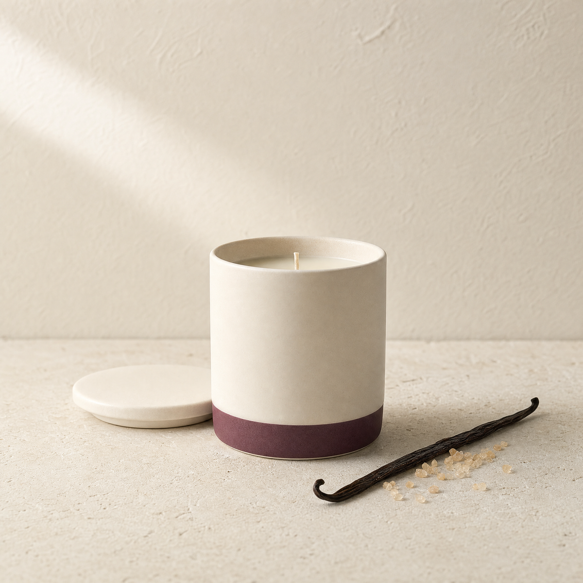 Vanilla sugar soy candle with a vanilla pod and scattered sugar