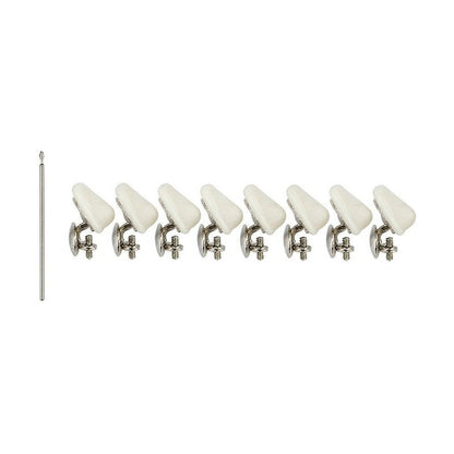 Replacement eyeglass nose pads with screwdriver on white background