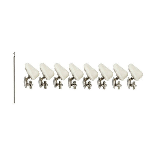 Replacement eyeglass nose pads with screwdriver on white background